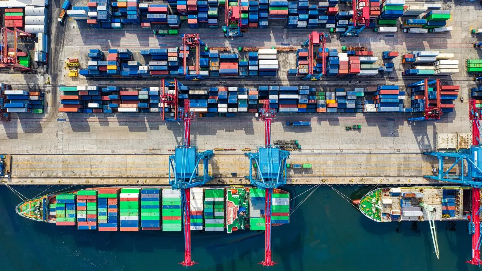 Container ships and cranes at a port illustrating Southeast Asia trade expansion