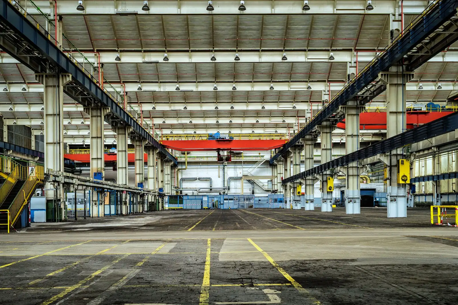 Industrial warehouse staging ferroalloy and mineral cargoes