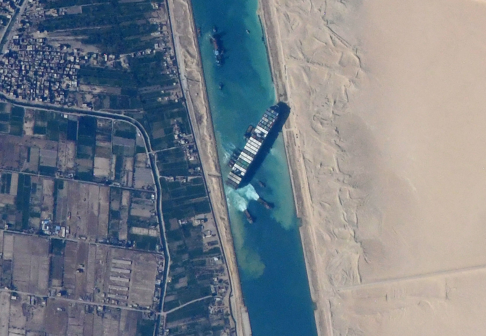 Ever Given in Suez Canal viewed from ISS